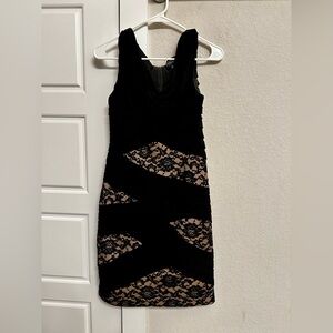 Gorgeous fitted black and lace dress.